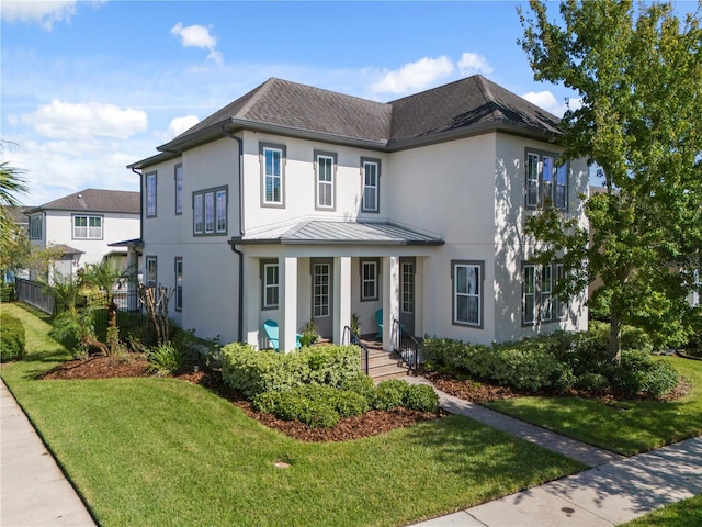 view of front of property featuring a front lawn