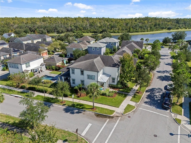 bird's eye view with a water view