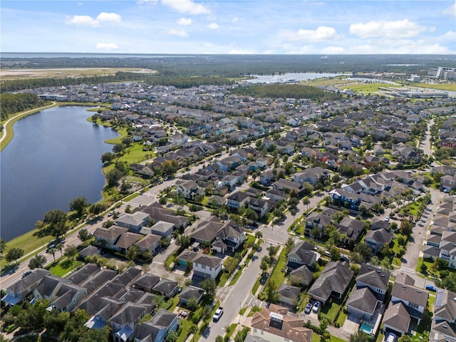 drone / aerial view with a water view