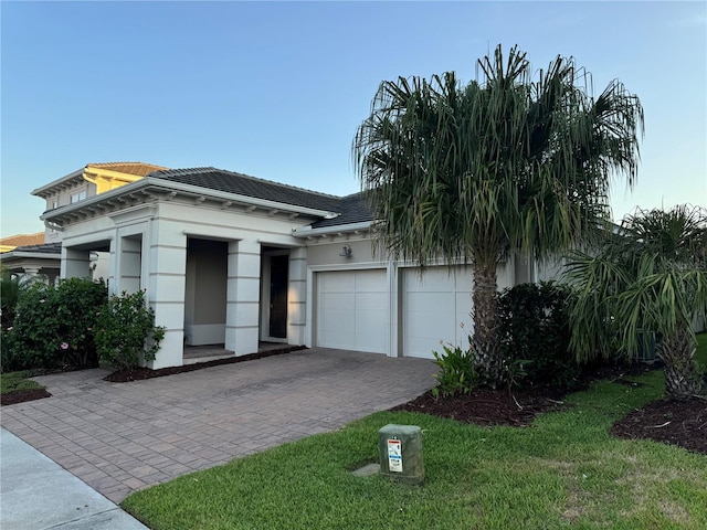 view of front of home with a garage