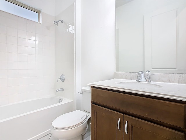 full bath featuring vanity, shower / tub combination, and toilet