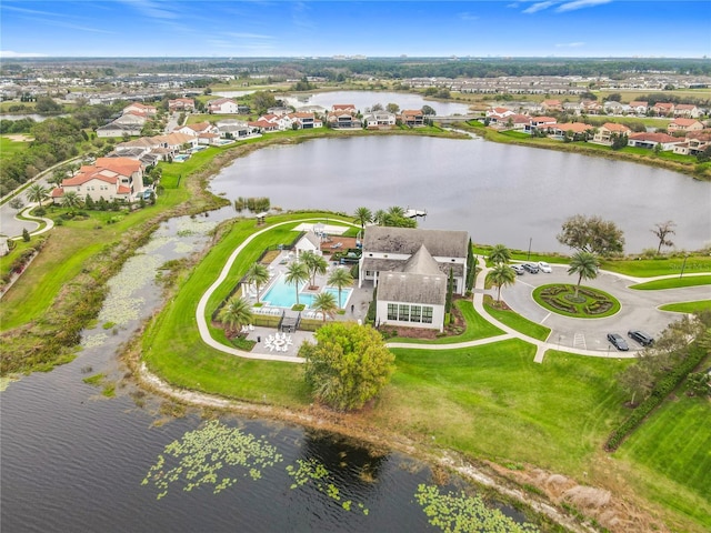 aerial view featuring a residential view and a water view