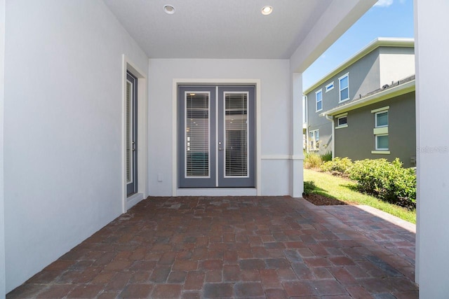 doorway to property with a patio and french doors