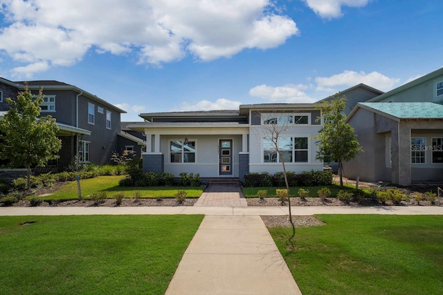 view of front of home featuring a front lawn