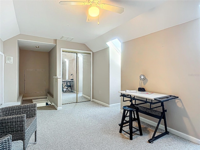 office with ceiling fan, light colored carpet, and lofted ceiling