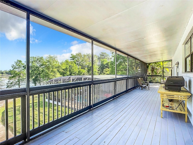 unfurnished sunroom with a healthy amount of sunlight