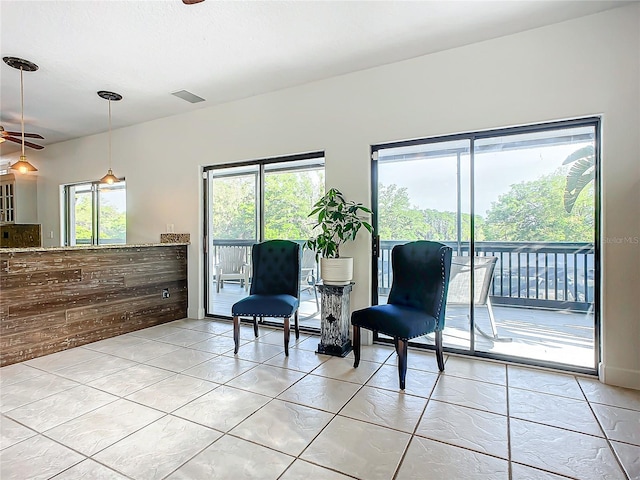 living area featuring light tile patterned floors