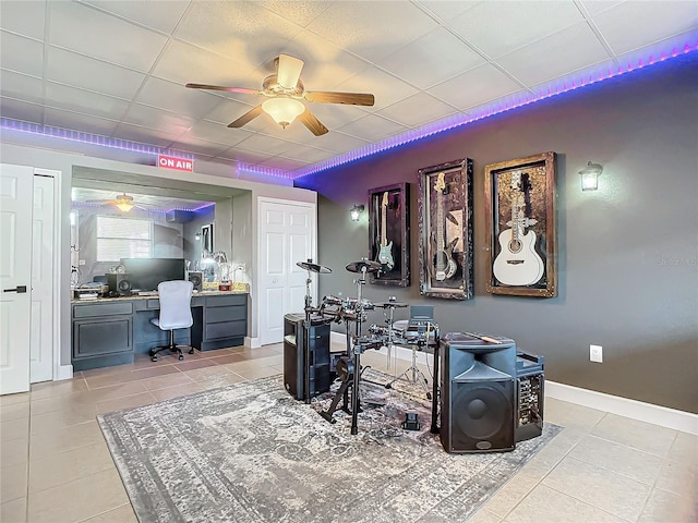 bar featuring ceiling fan and light tile patterned floors