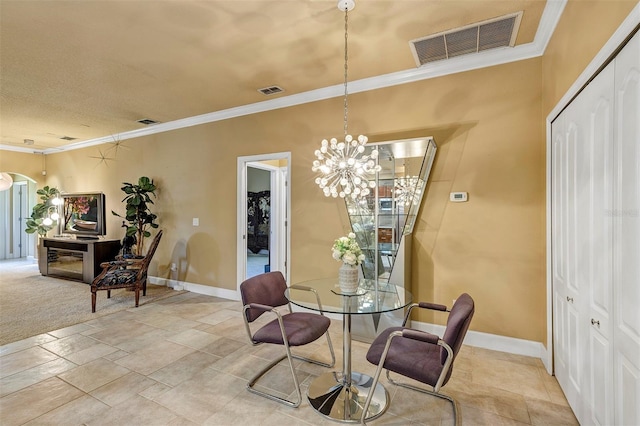 dining space featuring a chandelier and ornamental molding