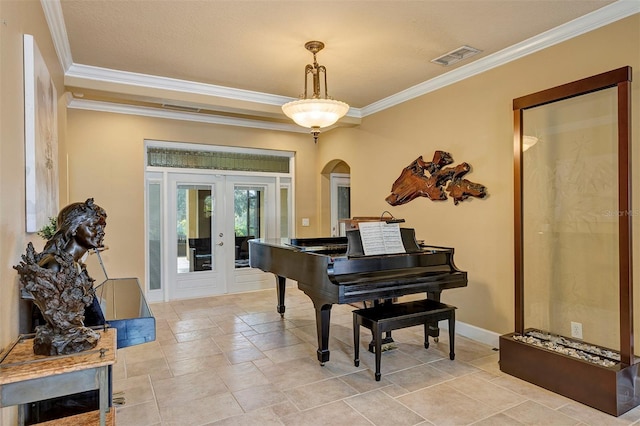 miscellaneous room featuring french doors and crown molding