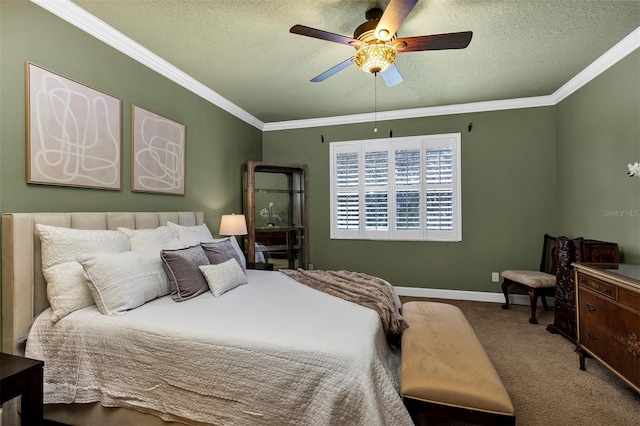 bedroom with ceiling fan, crown molding, carpet floors, and a textured ceiling