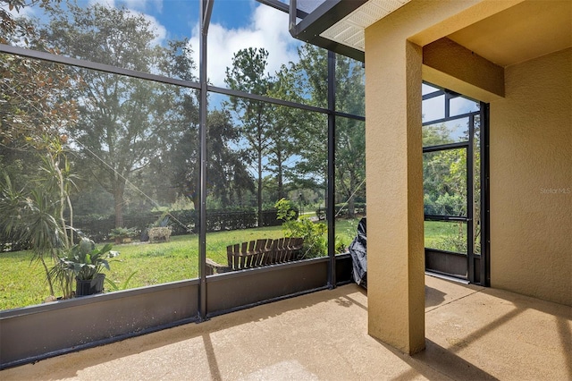 sunroom / solarium featuring plenty of natural light