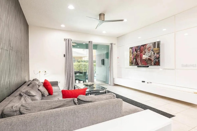 living area with tile patterned floors, recessed lighting, and a ceiling fan
