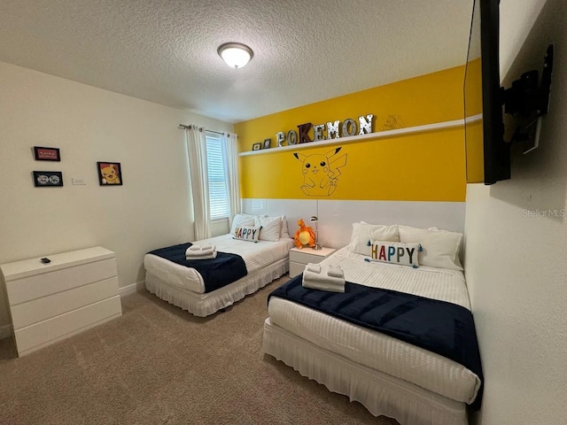 bedroom with a textured ceiling and carpet