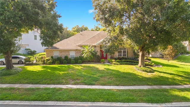 view of front of home featuring a front yard