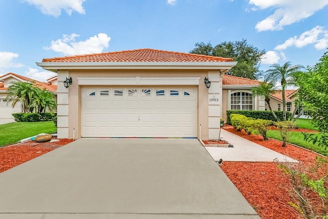 mediterranean / spanish-style house featuring a garage