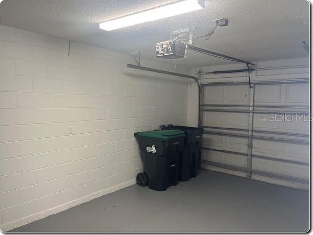 garage featuring a garage door opener