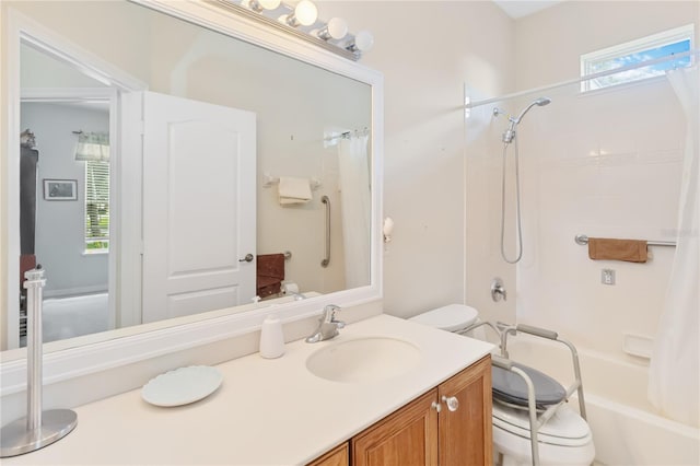 full bathroom featuring vanity, shower / tub combo, and toilet