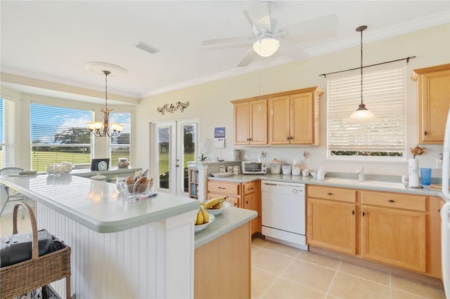 kitchen featuring ornamental molding, pendant lighting, and white dishwasher