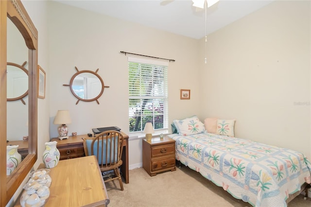 bedroom with ceiling fan and light colored carpet