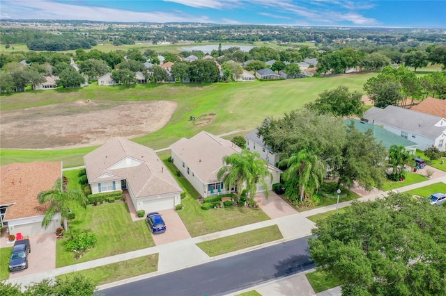 2366 Prairie Dunes, Clermont, FL 34711 - birds eye view of property with golf course view, a water view, and a residential view