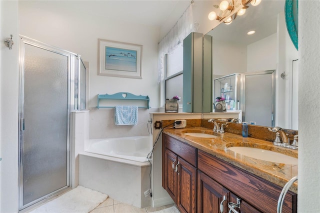 2366 Prairie Dunes, Clermont, FL 34711 - full bathroom with a sink, double vanity, a stall shower, and a garden tub