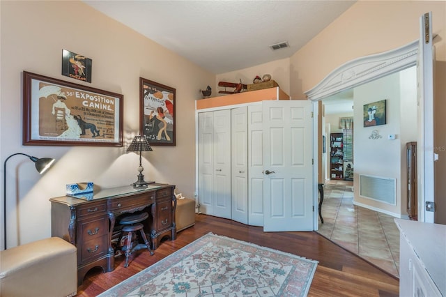 2366 Prairie Dunes, Clermont, FL 34711 - office area featuring visible vents and wood finished floors
