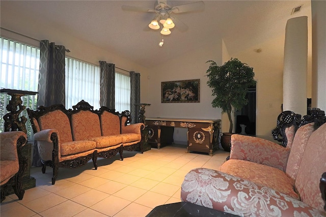 tiled living room featuring ceiling fan