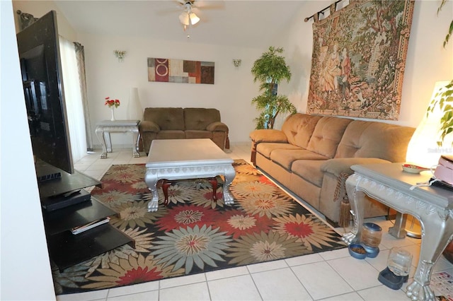 tiled living room with ceiling fan