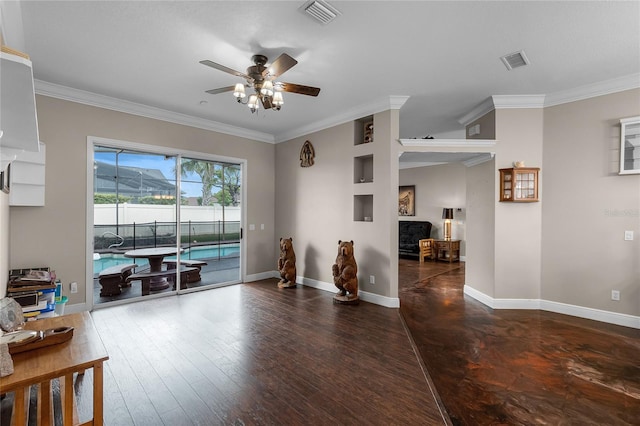 living room featuring ceiling fan, crown molding, and dark wood-type flooring