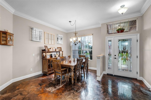 dining room featuring crown molding and a chandelier