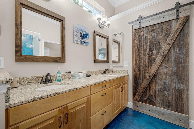 bathroom with crown molding and vanity