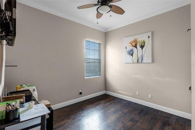 interior space with ornamental molding, ceiling fan, and dark wood-type flooring