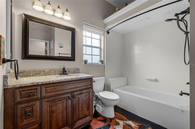 full bathroom featuring vanity, tiled shower / bath combo, and toilet