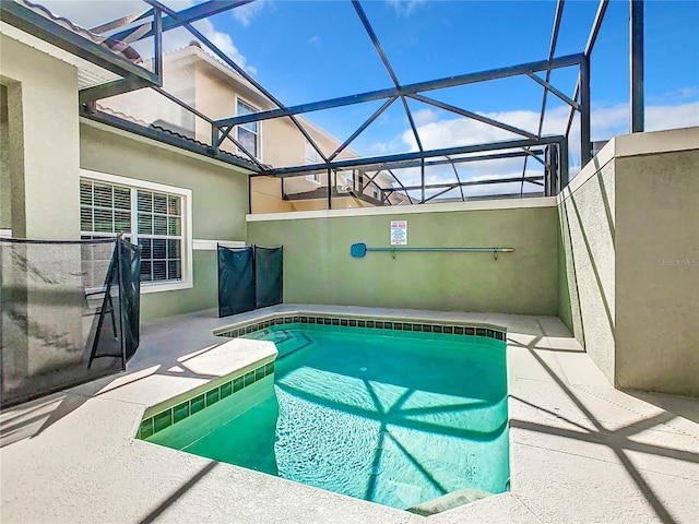 8967 California Palm Rd, Kissimmee, FL 34747 - outdoor pool with a lanai and a patio area