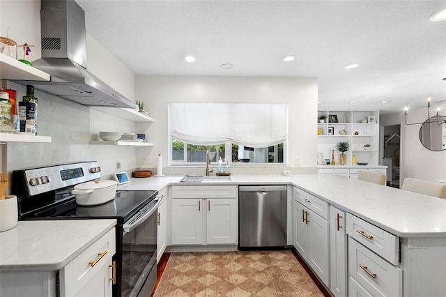 115 Marcy Blvd, Longwood, FL 32750 - kitchen featuring a peninsula, wall chimney exhaust hood, appliances with stainless steel finishes, a sink, and open shelves