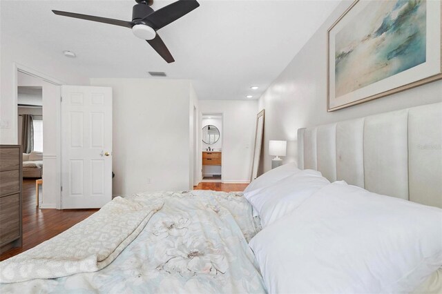 bedroom featuring ceiling fan and hardwood / wood-style flooring