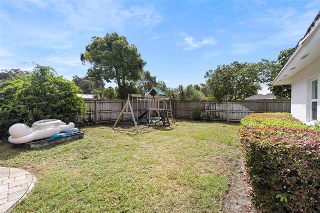 view of yard with a playground