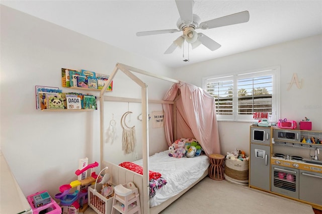 carpeted bedroom with ceiling fan