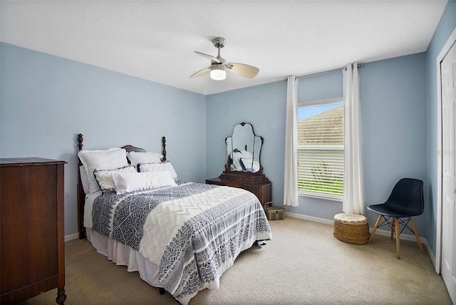 bedroom featuring carpet flooring and ceiling fan