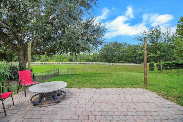 view of patio with a rural view