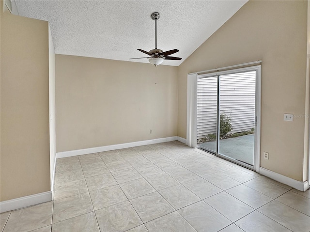 tiled empty room featuring ceiling fan, a textured ceiling, and high vaulted ceiling