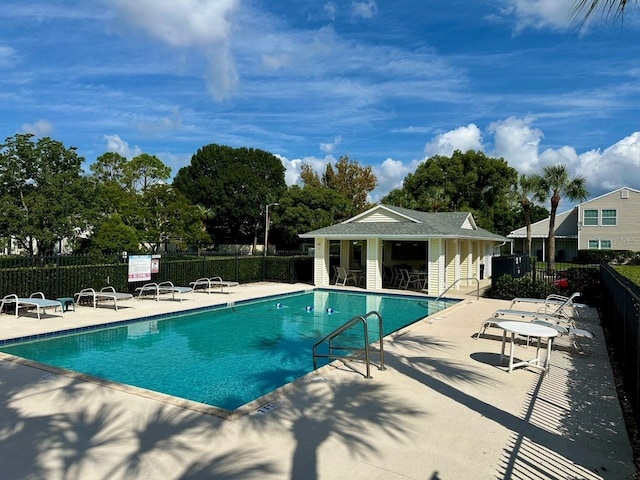 view of pool featuring a patio