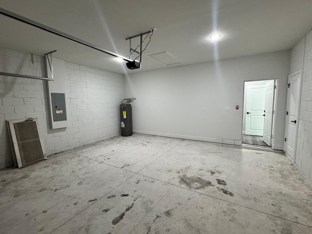 garage with a garage door opener, electric panel, and electric water heater