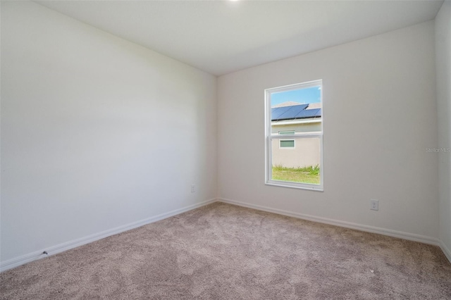 view of carpeted spare room