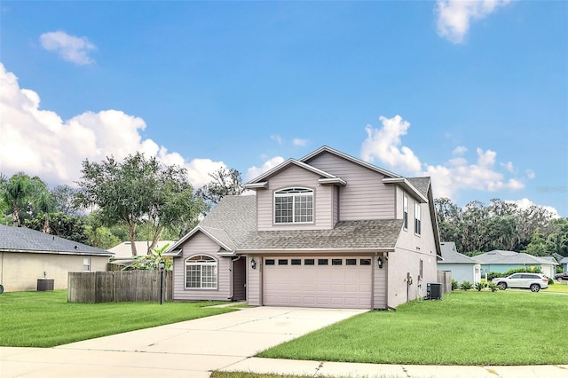 front facade featuring a garage and a front yard