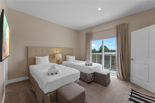 bedroom featuring carpet floors and access to exterior