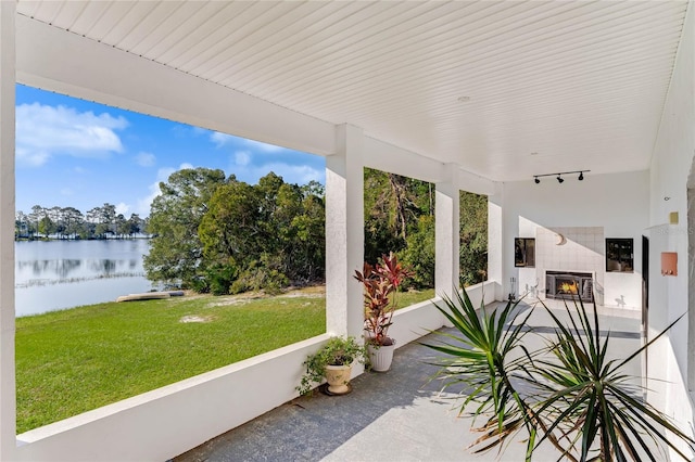 view of patio / terrace featuring a water view