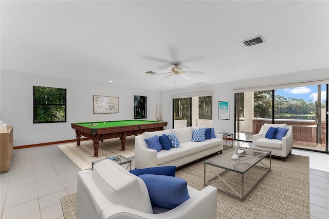 living room featuring ceiling fan, light tile patterned flooring, and billiards