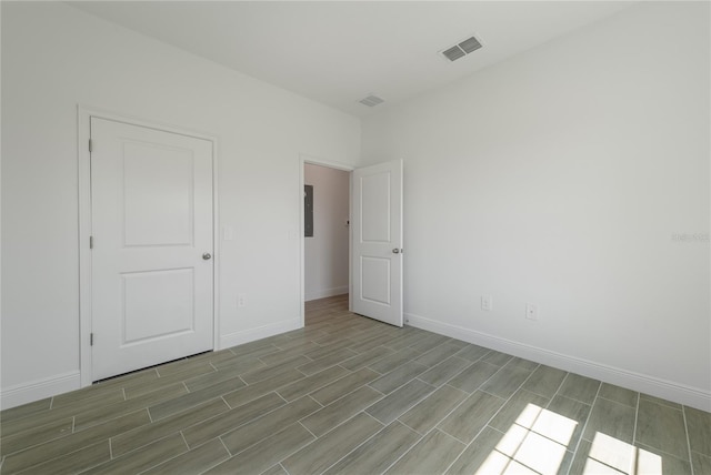 unfurnished bedroom with light wood-type flooring